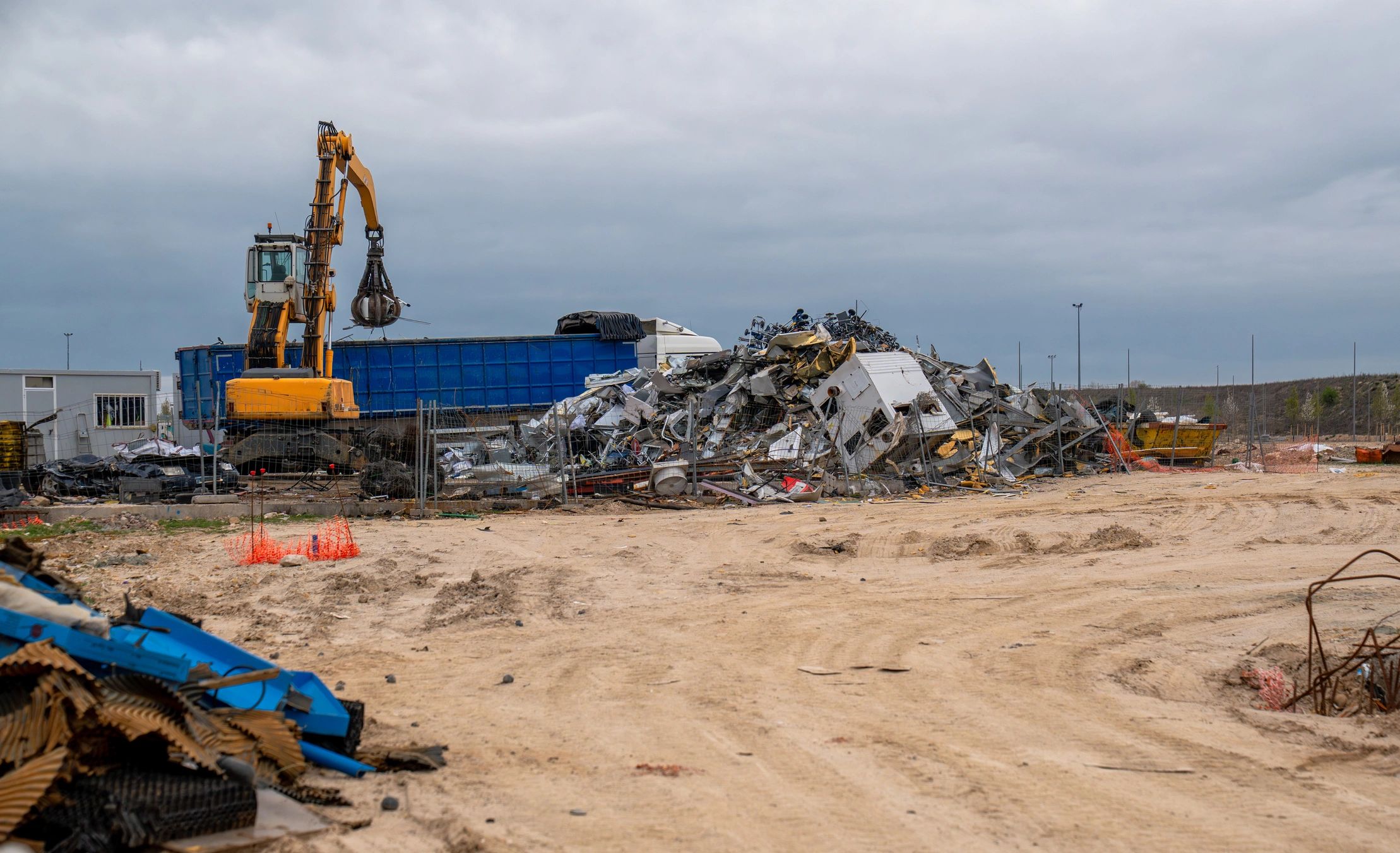 Industrial crane handling scrap metal during dismantling